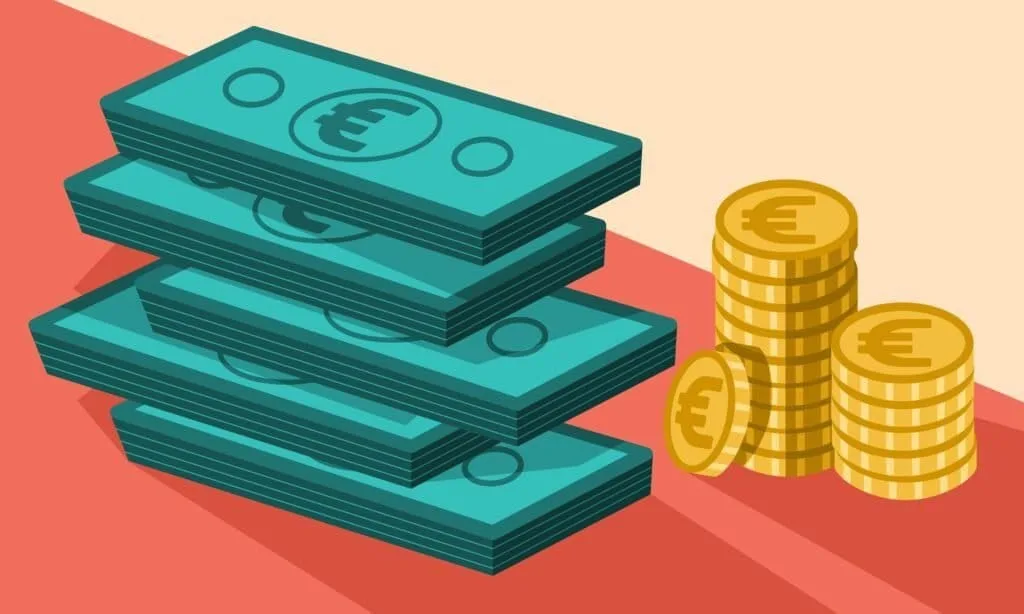 Money on a table showing fees or profits from trading